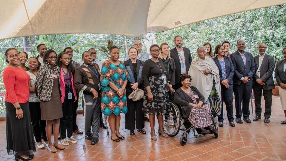 UNON DG Madam Zainab Hawa Bangura with staff and persons with disabilities at a UNON inclusion event.
