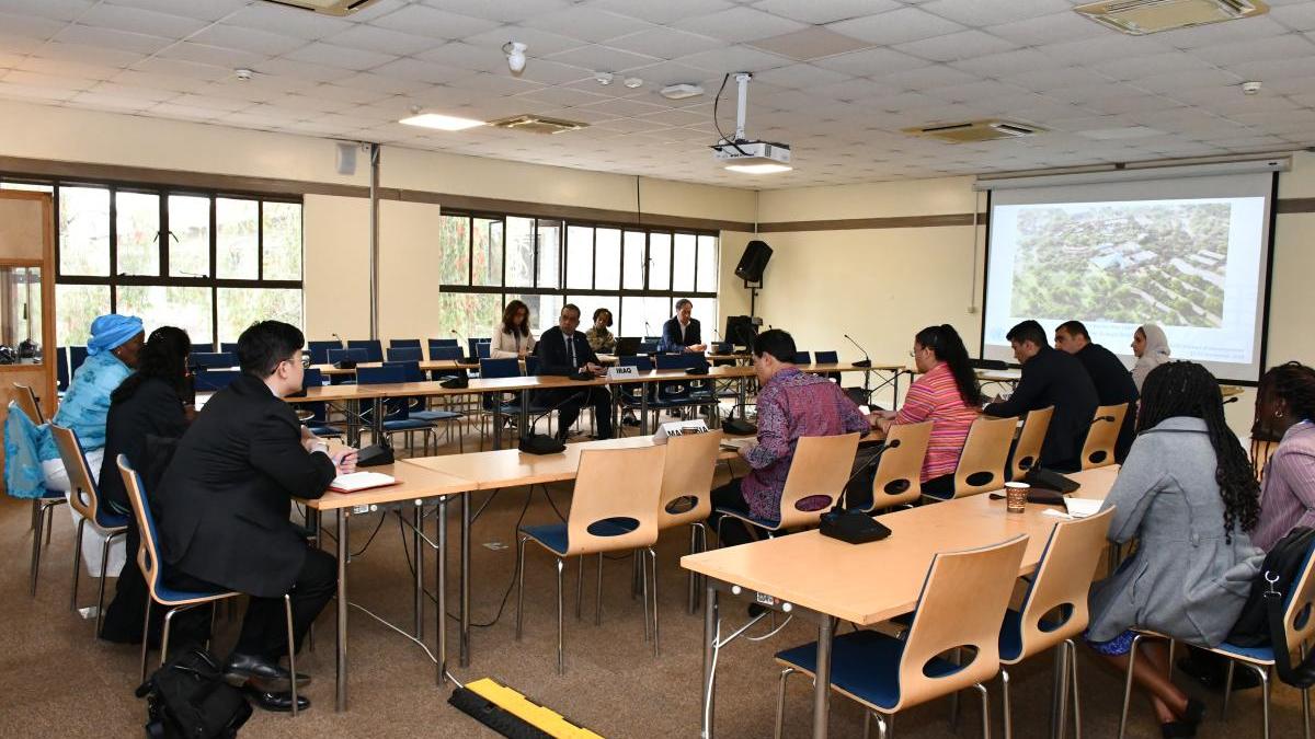 Members of the APG attending a presentation in a conference room