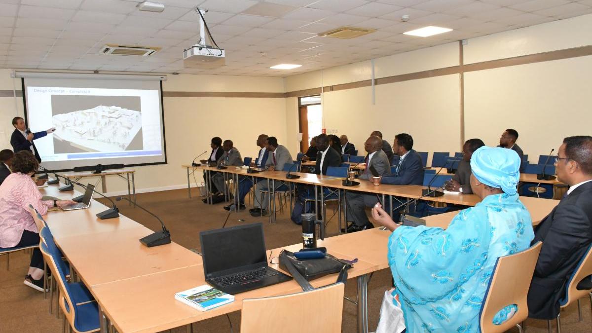 Members of the AG attending a presentation in a conference room
