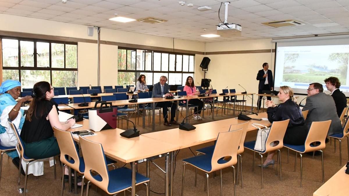 Members of the EEG attending a presentation in a conference room
