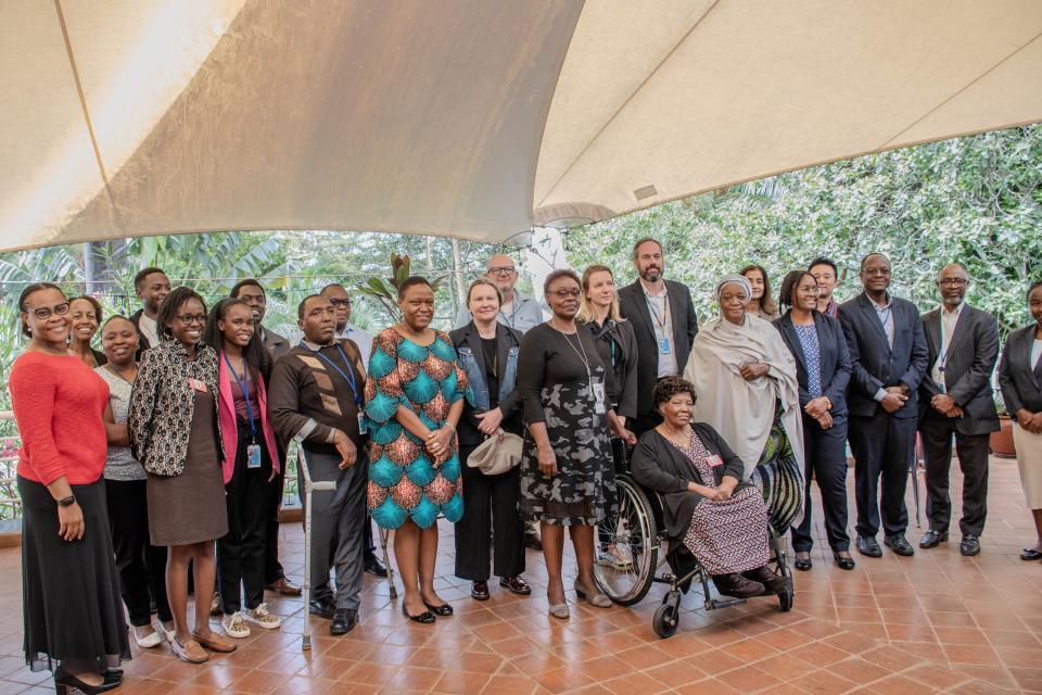 UNON DG Madam Zainab Hawa Bangura with staff and persons with disabilities at a UNON inclusion event.