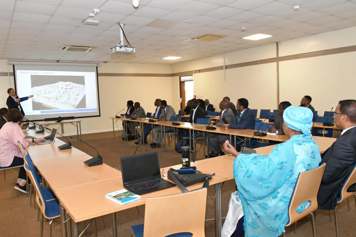 Members of the AG attending a presentation in a conference room