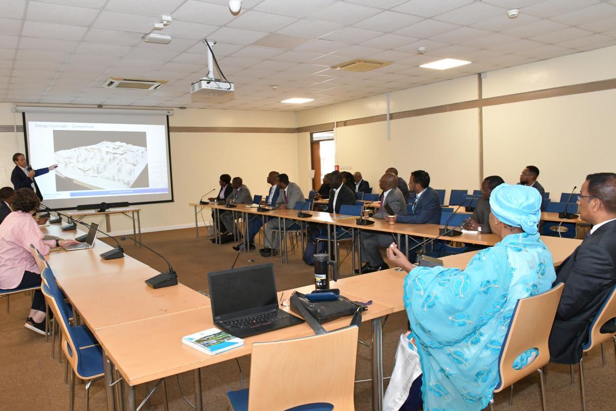 Members of the AG attending a presentation in a conference room